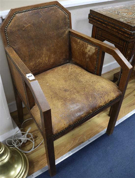 An Art Deco beech and leather tub chair